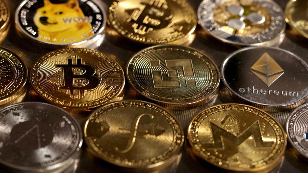 FILE PHOTO: Illustration shows representations of cryptocurrencies