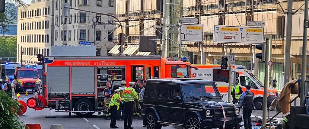 Car drives into group of people