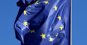 FILE PHOTO: European Union flags flutter outside the EU Commission headquarters in Brussels