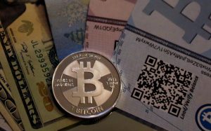 FILE PHOTO: One of Bitcoin enthusiast Mike Caldwell's coins in this photo illustration at his office in Sandy, Utah